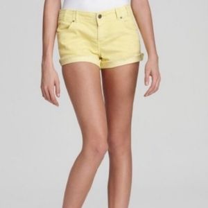 Free People yellow cut off shorts